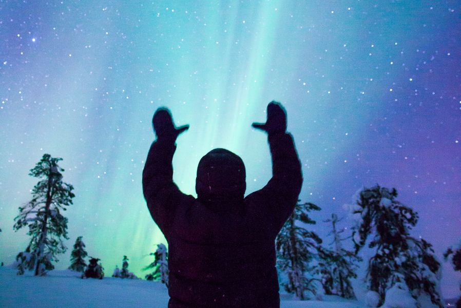 Northern Lights with silhouette of man