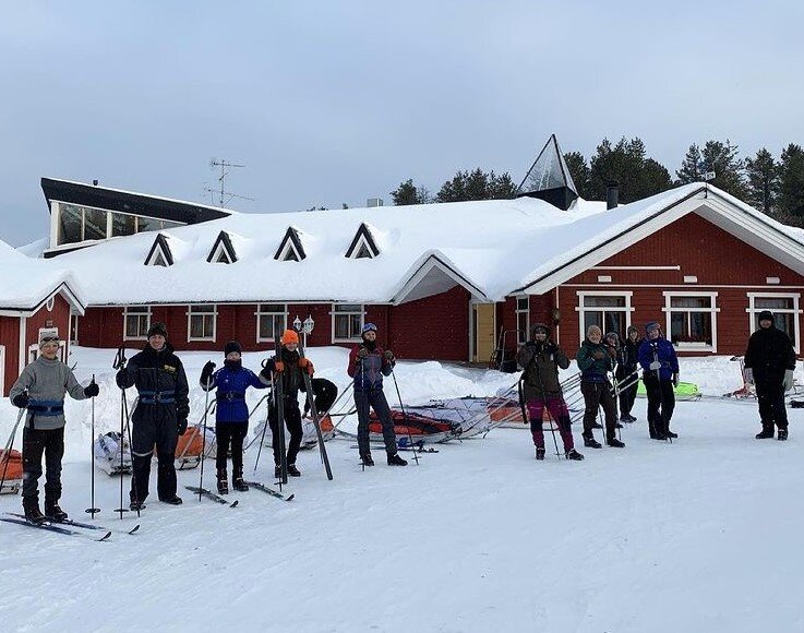 A group getting ready to go cross country skiing