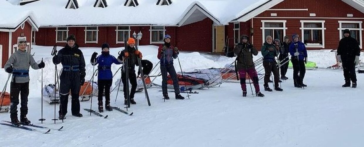 A group getting ready to go cross country skiing