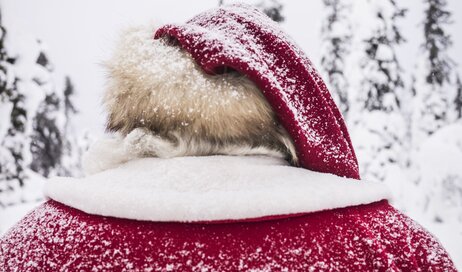 Santa out in a snowy landscape
