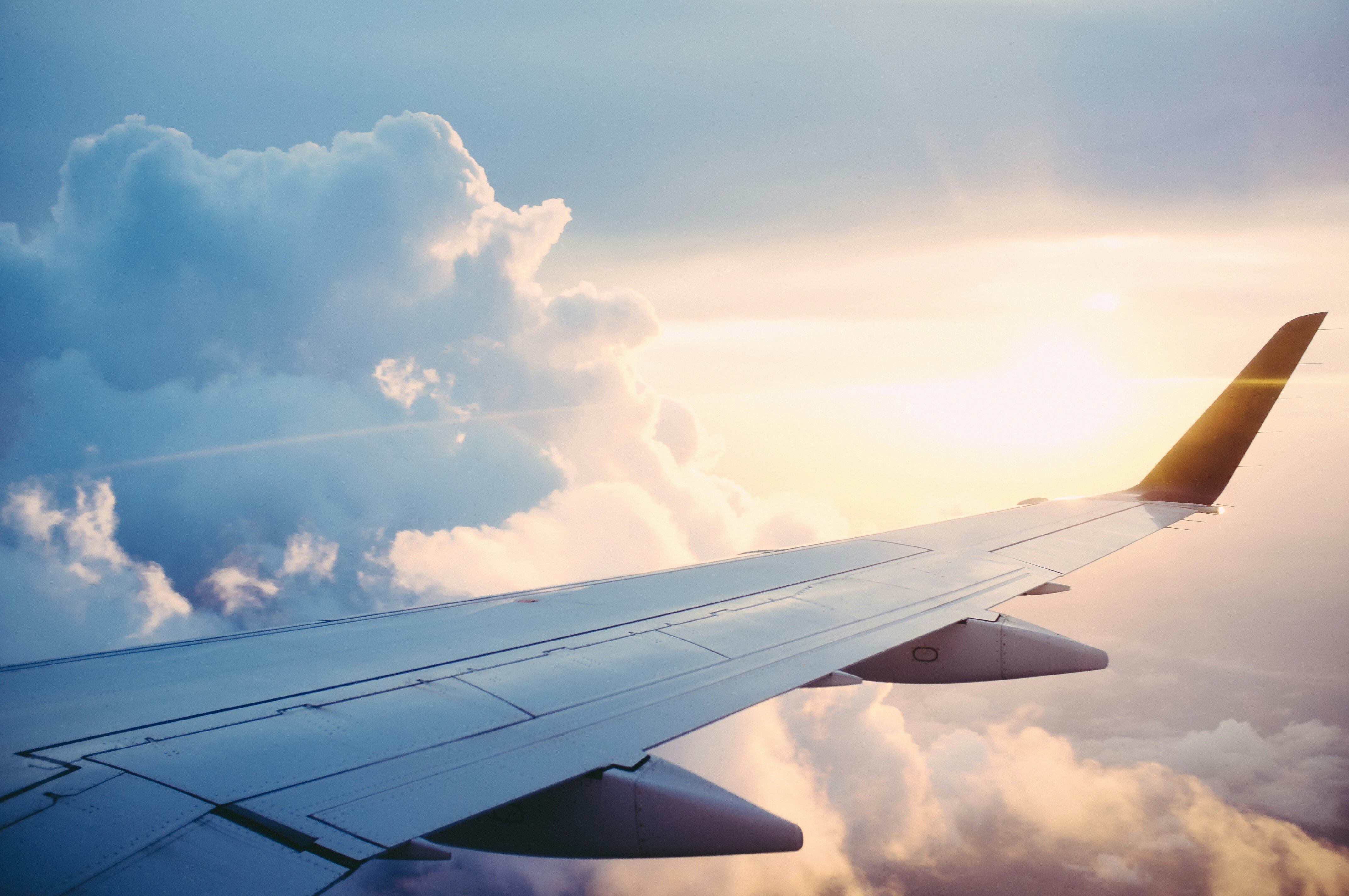 A plane in flight going through clouds