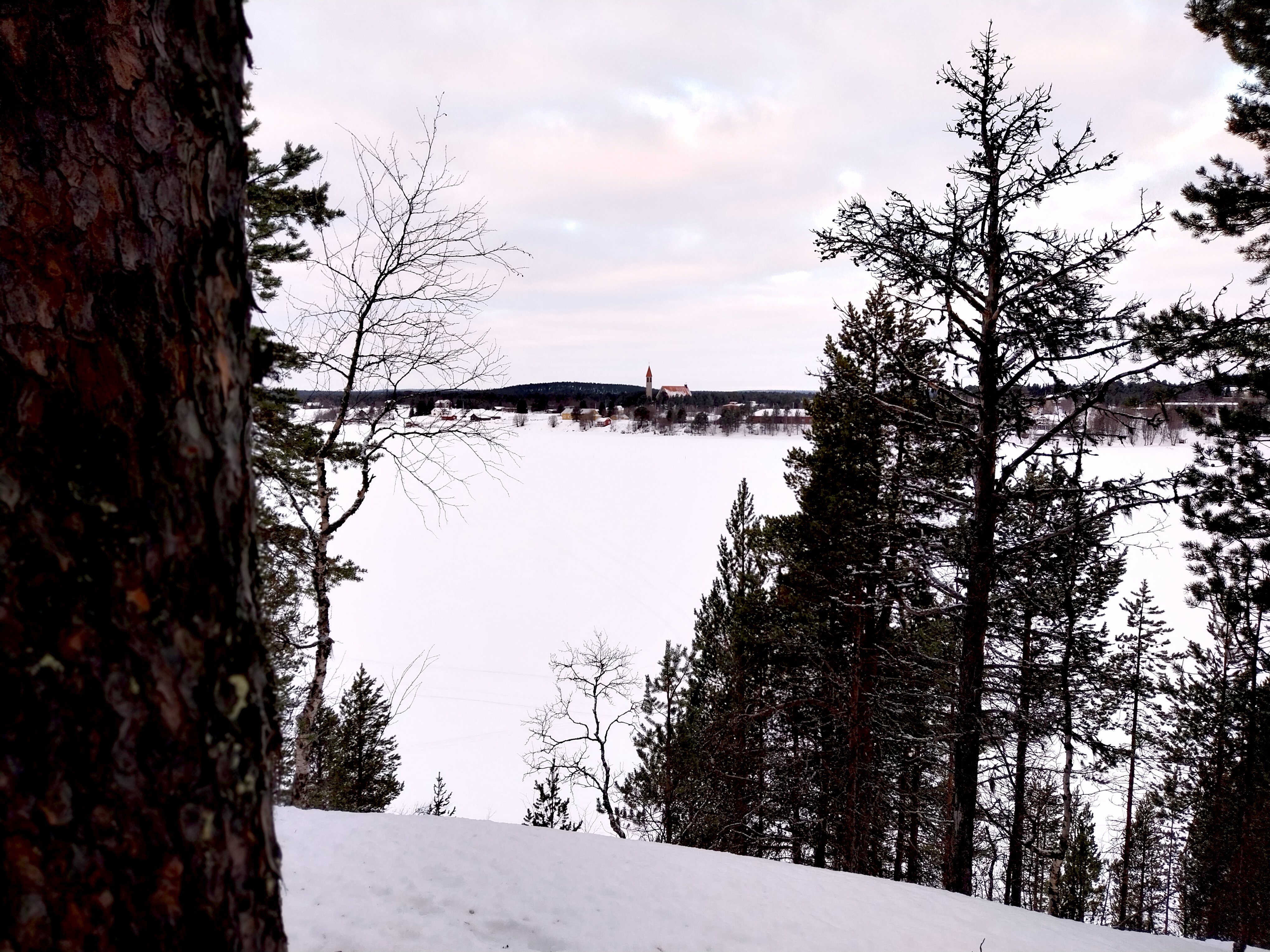 Looking across frozen Lake Ounasjarvi in Hetta from a high viewpoint