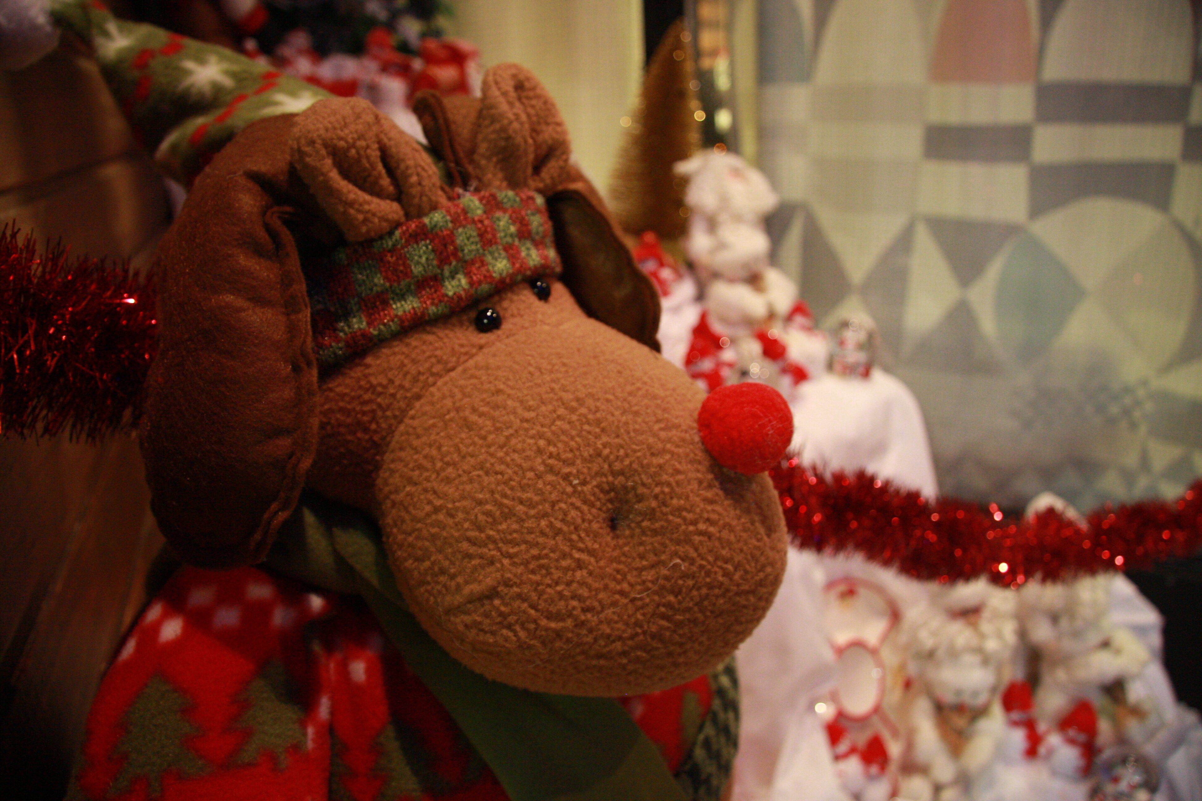 A Rudolph the Red-Nosed Reindeer stuffed toy