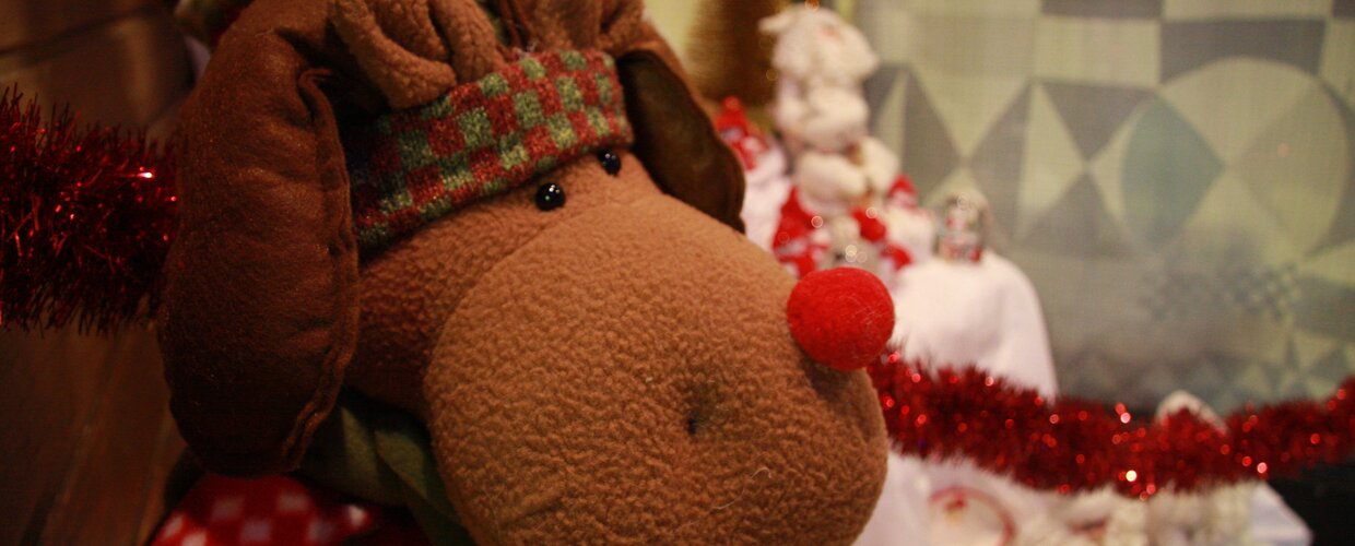 A Rudolph the Red-Nosed Reindeer stuffed toy